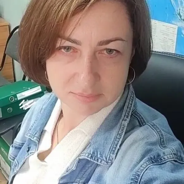 Мила